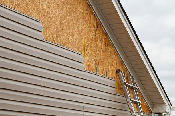 Professional Emergency Siding Repair technician working in Centereach, NY